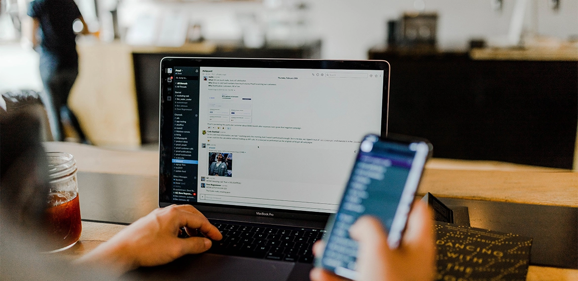 A person with a phone in his hand and developing a mobile app
